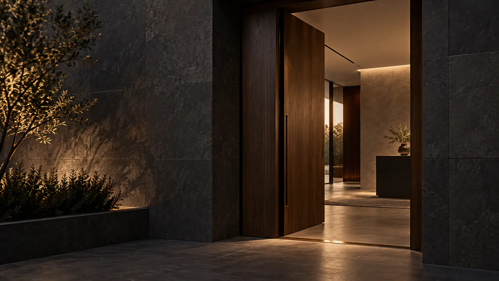 Ingresso architettonico discreto senza insegna aperto verso una luce accogliente.